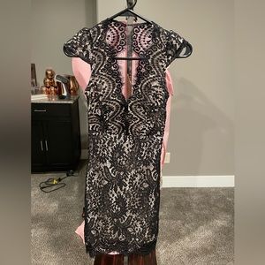 Black lace over nude dress